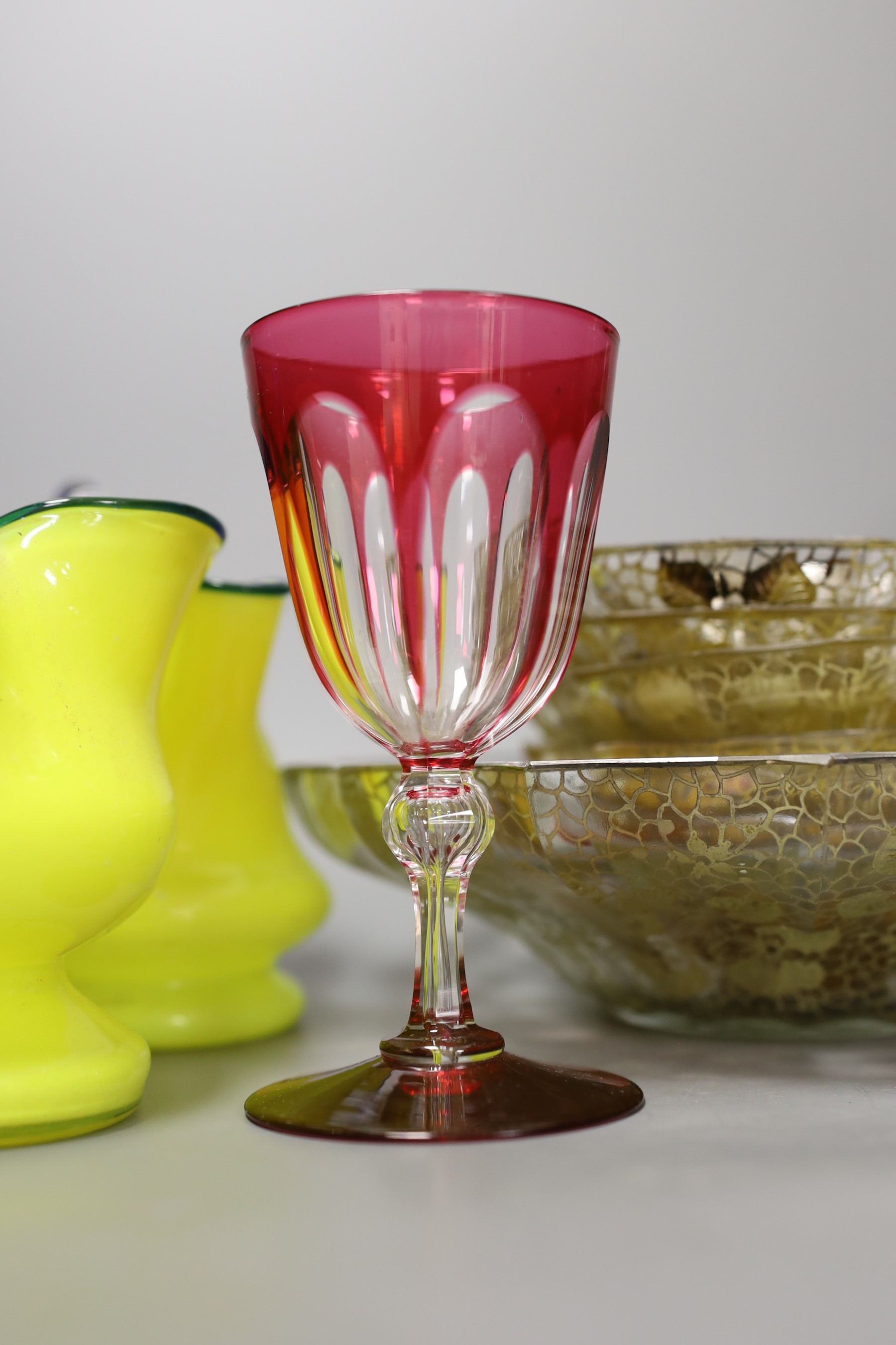 A pair of ruby overlaid goblets, three ruby and glass pickle jars and other sundry glassware